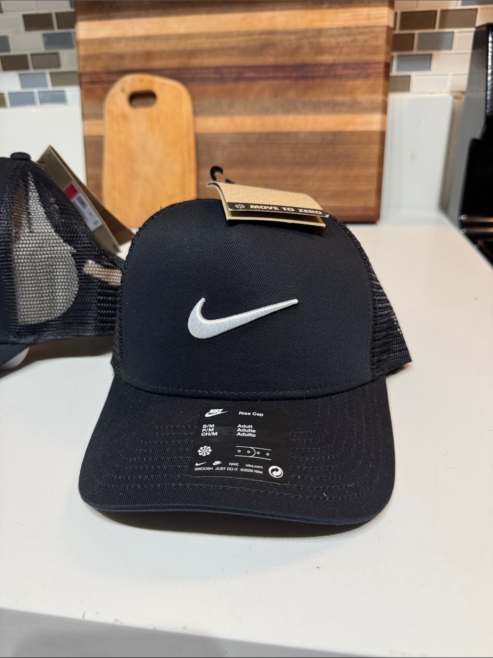 Nike Black Cap with White Swoosh Logo